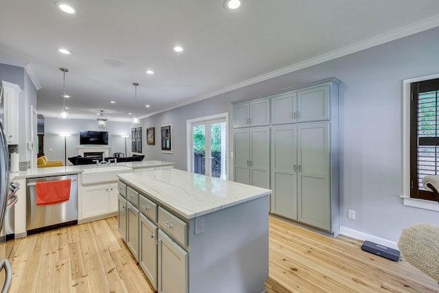 574 SW Newberry St, Aiken, SC 29801 - kitchen with dishwasher, light wood-style flooring, crown molding, open floor plan, and a peninsula