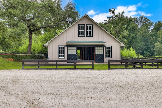 574 SW Newberry St, Aiken, SC 29801 - modern farmhouse featuring an exterior structure, a standing seam roof, board and batten siding, an outbuilding, and a metal roof