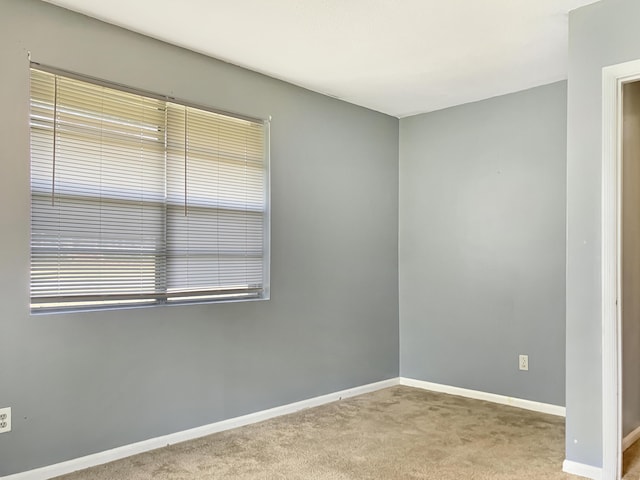 10236 S Ga Highway 23, Girard, GA 30426 - spare room featuring light carpet