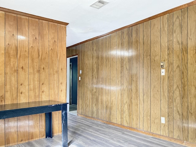 10236 S Ga Highway 23, Girard, GA 30426 - rec room featuring light wood-type flooring, crown molding, and wooden walls