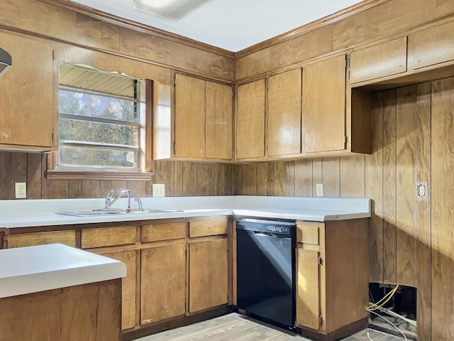 10236 S Ga Highway 23, Girard, GA 30426 - kitchen featuring wood walls, sink, light wood-type flooring, and black dishwasher
