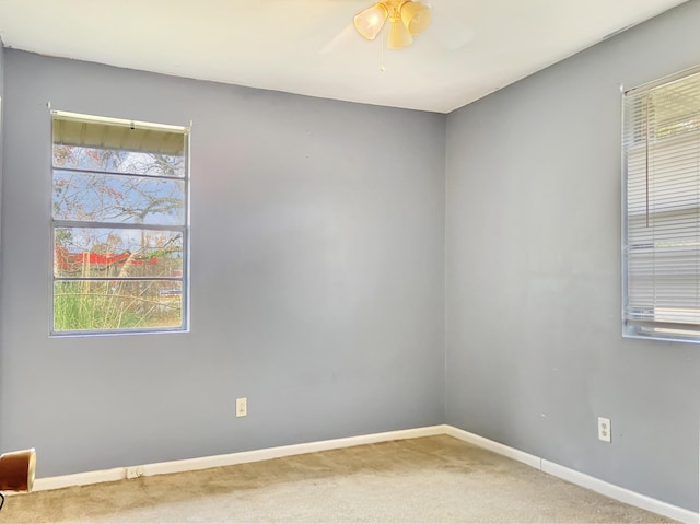 10236 S Ga Highway 23, Girard, GA 30426 - carpeted empty room featuring ceiling fan and a healthy amount of sunlight