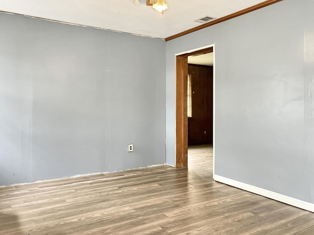 10236 S Ga Highway 23, Girard, GA 30426 - unfurnished room featuring hardwood / wood-style floors and ornamental molding