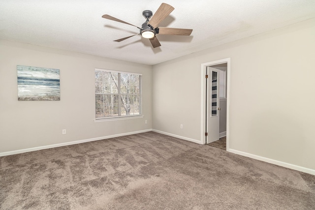 unfurnished room with ceiling fan, a textured ceiling, and carpet flooring