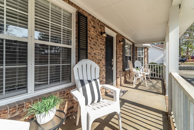 view of patio featuring a porch