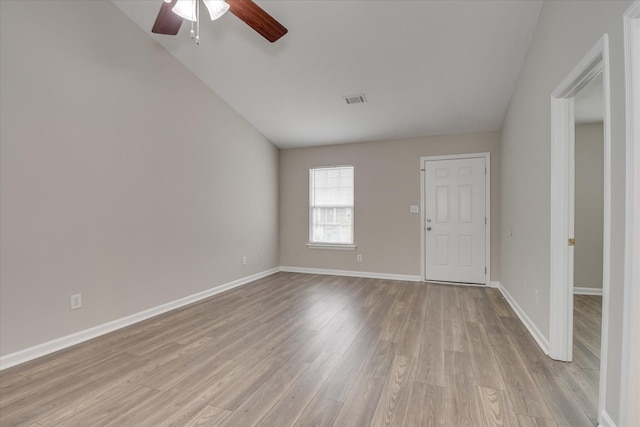 unfurnished room featuring visible vents, baseboards, ceiling fan, and wood finished floors