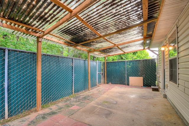 view of patio / terrace with a fenced backyard and a pergola