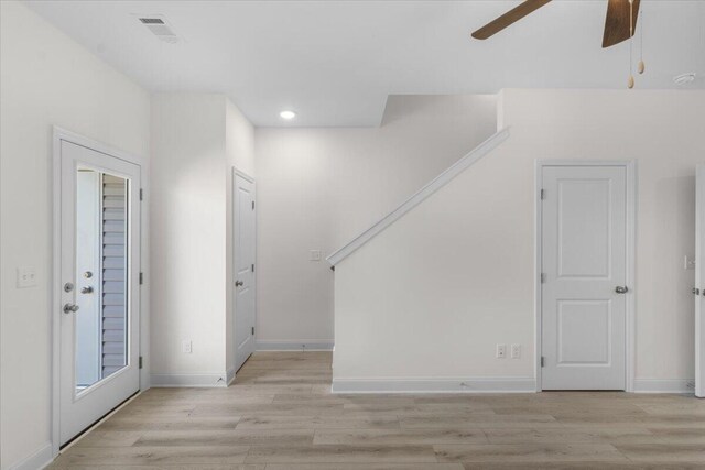 entrance foyer featuring ceiling fan and light wood-type flooring