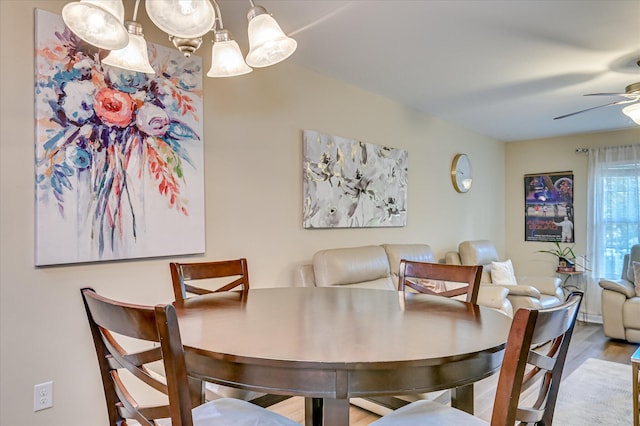 6005 Village W Ln, Graniteville, SC 29829 - dining area featuring ceiling fan, a chandelier, and wood finished floors