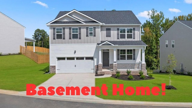 craftsman house with a front lawn, fence, a porch, and board and batten siding