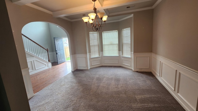 2806 Huntcliffe Dr, Augusta, GA 30909 - carpeted empty room with arched walkways, beamed ceiling, a chandelier, a decorative wall, and crown molding