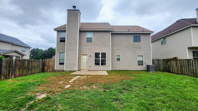 2806 Huntcliffe Dr, Augusta, GA 30909 - back of property featuring a fenced backyard, a patio, and a chimney
