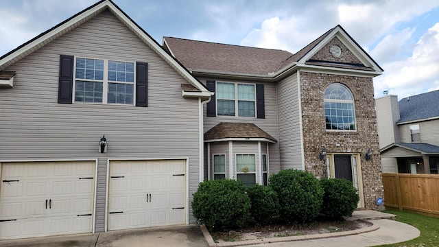 2806 Huntcliffe Dr, Augusta, GA 30909 - traditional home featuring a garage, concrete driveway, and roof with shingles