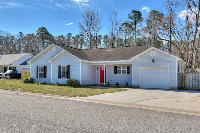 single story home featuring driveway, an attached garage, fence, and a front yard