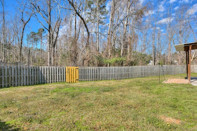 view of yard with a patio area and a fenced backyard