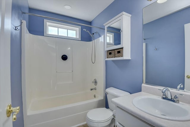 full bath with washtub / shower combination, vanity, and toilet