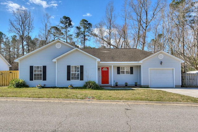 ranch-style house with a garage, driveway, a front yard, and fence