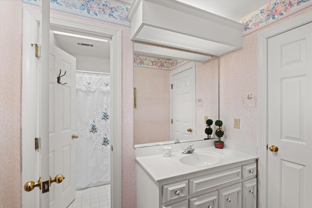 714 Jones Crk, Evans, GA 30809 - bathroom featuring vanity and wallpapered walls