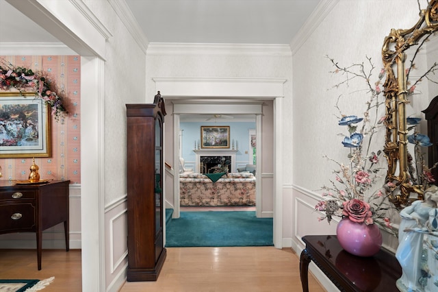 714 Jones Crk, Evans, GA 30809 - hall with light wood-style flooring, wainscoting, ornamental molding, and wallpapered walls