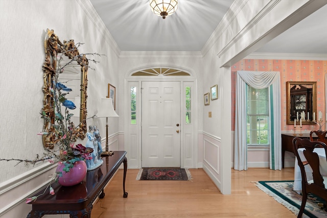714 Jones Crk, Evans, GA 30809 - entryway featuring wallpapered walls, crown molding, wood finished floors, and a wainscoted wall