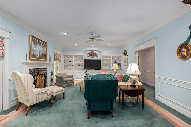 714 Jones Crk, Evans, GA 30809 - living area with a premium fireplace, ornamental molding, a ceiling fan, carpet, and built in features