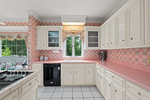 714 Jones Crk, Evans, GA 30809 - kitchen featuring black appliances, a sink, wallpapered walls, plenty of natural light, and light countertops