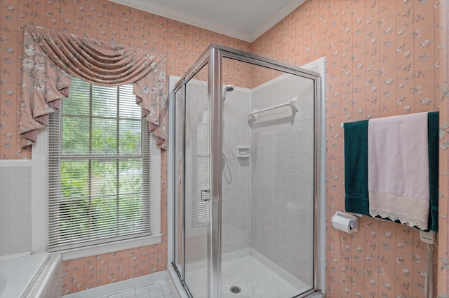 714 Jones Crk, Evans, GA 30809 - bathroom featuring a stall shower, crown molding, wallpapered walls, tile patterned floors, and a tub