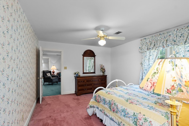714 Jones Crk, Evans, GA 30809 - carpeted bedroom with baseboards and a ceiling fan