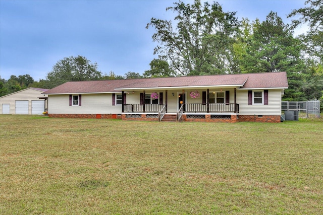 single story home with an outdoor structure, a garage, a porch, and a front yard