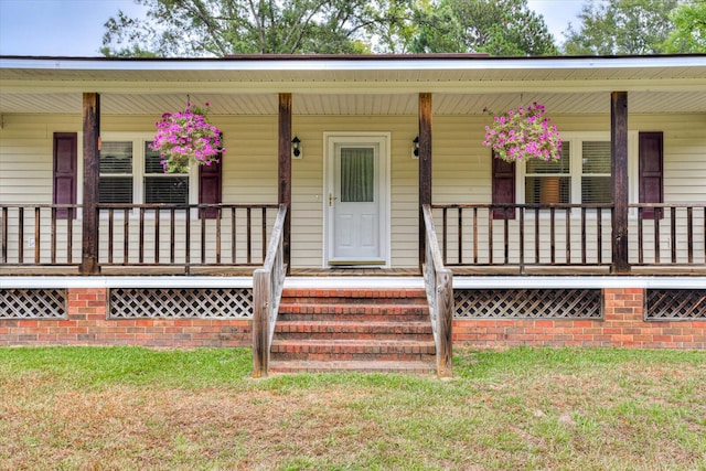 property entrance featuring a porch