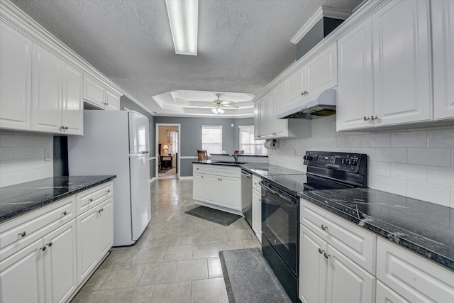 kitchen featuring white cabinetry, stainless steel dishwasher, ceiling fan, and black range with electric cooktop