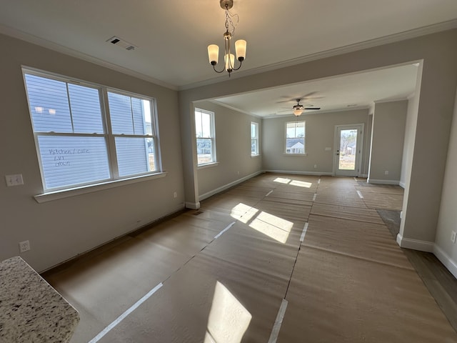 spare room with crown molding and ceiling fan with notable chandelier