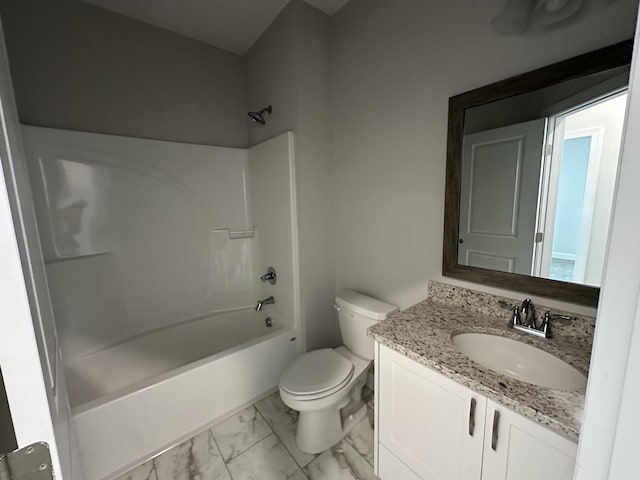 full bathroom featuring vanity, bathing tub / shower combination, and toilet