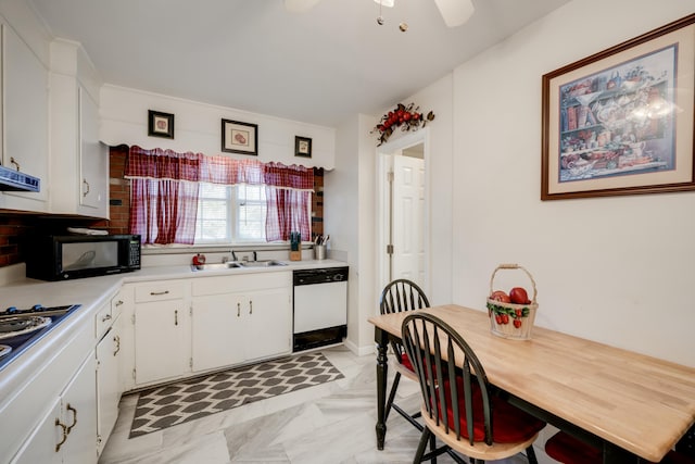 kitchen with white cabinetry, white appliances, ceiling fan, and sink