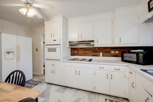 kitchen featuring white cabinetry, white appliances, and ceiling fan