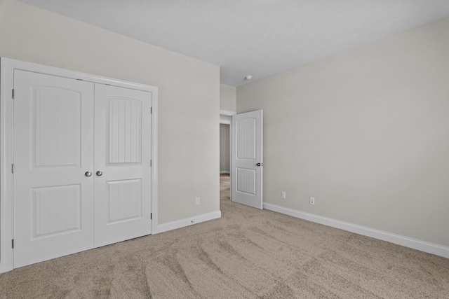 1216 Elbron Dr, Augusta, GA 30909 - unfurnished bedroom featuring carpet floors, baseboards, and a closet