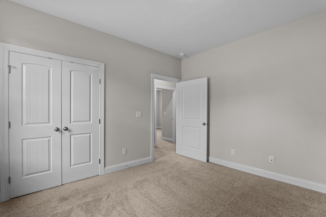 1216 Elbron Dr, Augusta, GA 30909 - unfurnished bedroom featuring carpet flooring, baseboards, and a closet