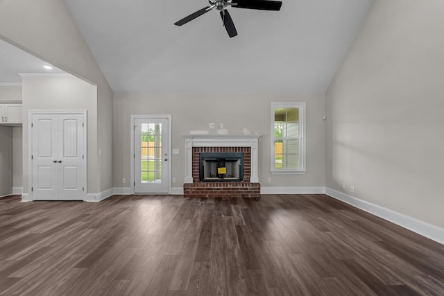 1216 Elbron Dr, Augusta, GA 30909 - unfurnished living room featuring a ceiling fan, dark wood-type flooring, a fireplace, baseboards, and high vaulted ceiling