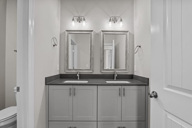1216 Elbron Dr, Augusta, GA 30909 - full bathroom featuring double vanity and toilet