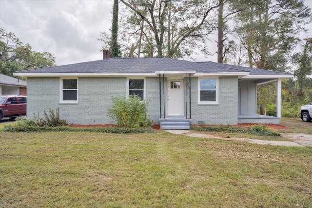 ranch-style home with a front yard