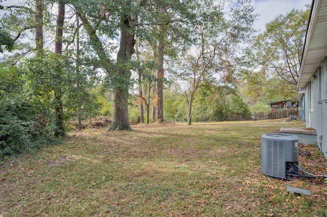 view of yard with central AC unit