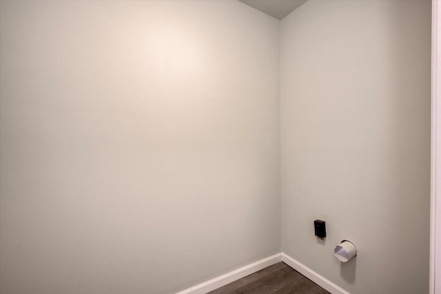 laundry room featuring dark hardwood / wood-style flooring