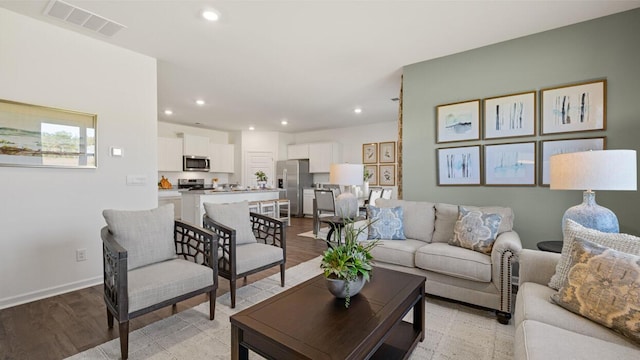 1260 Birch Cir, Grovetown, GA 30813 - living room featuring recessed lighting, light wood-type flooring, and baseboards