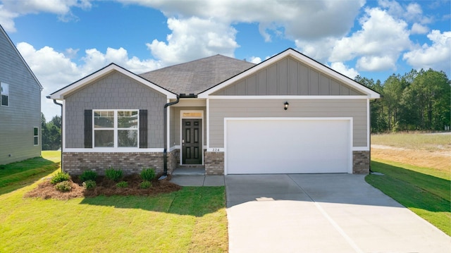 1260 Birch Cir, Grovetown, GA 30813 - craftsman house with brick siding, concrete driveway, a front lawn, and an attached garage