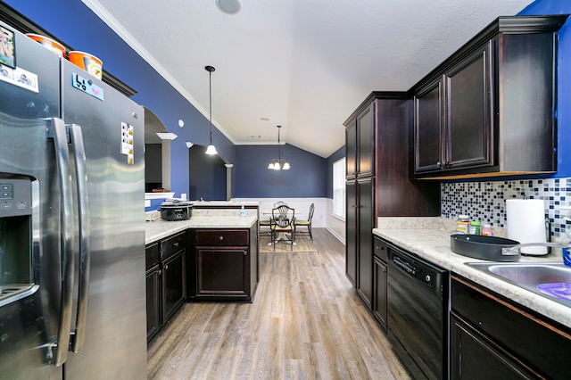 kitchen with vaulted ceiling, decorative light fixtures, dishwasher, stainless steel fridge with ice dispenser, and a chandelier