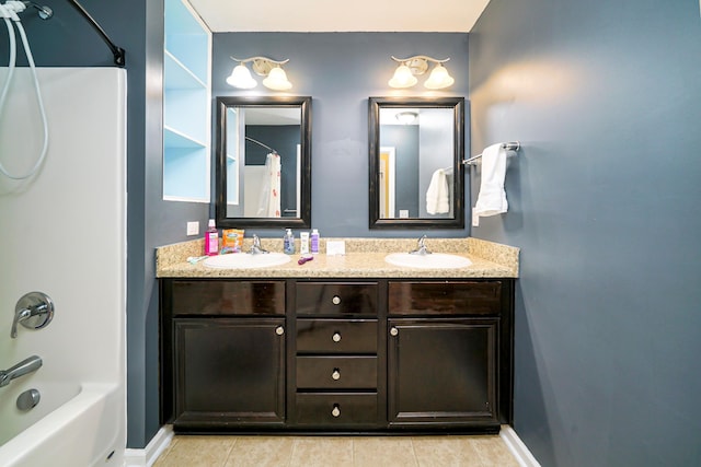 bathroom with tile patterned flooring, vanity, and shower / bath combo