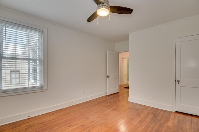 538 Hickman Rd, Augusta, GA 30904 - spare room with plenty of natural light, light wood-style flooring, a ceiling fan, and crown molding