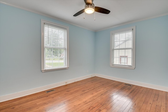 538 Hickman Rd, Augusta, GA 30904 - spare room with wood-type flooring, plenty of natural light, crown molding, and ceiling fan