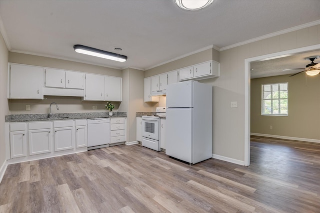 kitchen featuring crown molding, light wood-type flooring, white cabinets, and white appliances