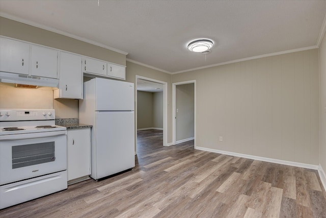 kitchen featuring light wood finished floors, under cabinet range hood, white appliances, ornamental molding, and dark countertops